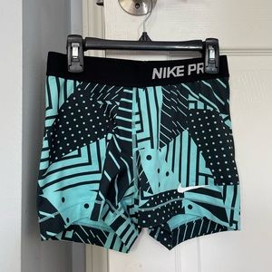 Nike pros, size small